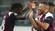 Moise Kean Kylian Mbappé Ligue des champions PSG TOLGA BOZOGLU / POOL / AFP