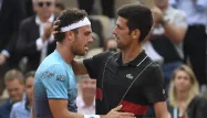 Cecchinato avec Djokovic (1280x640) Eric FEFERBERG / AFP