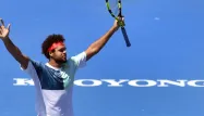 Tsonga lève les bras après son match contre Coric jeudi 12 novembre.