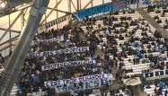 Des supporters de l'OM ont écrit "This game is over" à l'attention de Patrice Évra, pastichant le slogan "I love this game" du joueur qui a frappé l'un d'eux.