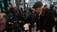 Les Iraniens aux urnes, pour ou contre la poursuite de l'ouverture