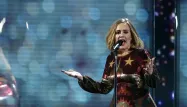 La chanteuse Adele, lors de la cérémonie des Brit Awards 2016 (1280x640) JUSTIN TALLIS / AFP
