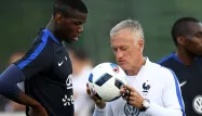 Paul Pogba et Didier Deschamps (1280x640) FRANCK FIFE / AFP