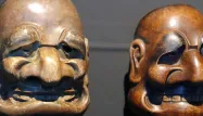 Des masques traditionnels japonais de l'exposition "Jacques Chirac ou le dialogue des cultures", qui ressemblent à l'ancien président