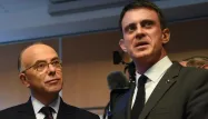 PHILIPPE DESMAZES / AFP valls cazeneuve