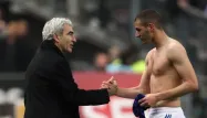 Domenech avec Benzema (1280x640) Patrick KOVARIK/AFP