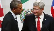 Obama et Harper parient une caisse de bières