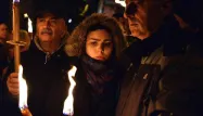 Des milliers de personnes ont participé  à une marche en commémoration des victimes du séisme qui avait tué 309 personnes il y a cinq ans.