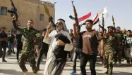 Des volontaires en Irak s'enrôlent pour combattre les djihadistes de l'EIIL.