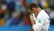 Rooney abattu après la défaite face à l'Uruguay.