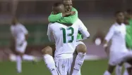 Feghouli et Slimani fêtent la qualification pour la Coupe du monde 2014, au Brésil.