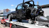 La Jeep Wrangler de la victime complètement pulvérisée à l'arrière.
