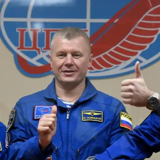 Thomas Pesquet, astronaute français (à droite), en compagnie de ses deux coéquipiers, l'Américaine Peggy Whitson et le Russe Oleg Novitsky.
