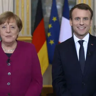 Angela Merkel, Emmanuel Macron, Handout / Presidence de le République Francaise / AFP 1280