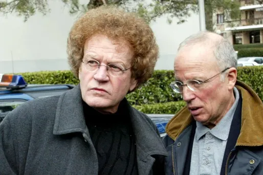 Robert Herbin (à gauche) aux cotés de l'ancien journaliste Thierry Roland lors des obsèques d'Albert Batteux en mars 2003