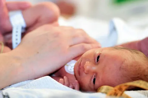 bébé, illustration crédit : PHILIPPE HUGUEN / AFP - 1280