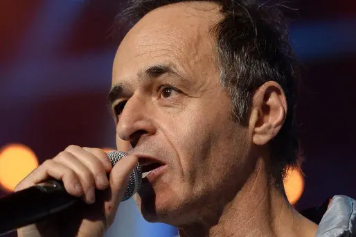 Polémique sur le clip des Enfoirés : Goldman assume