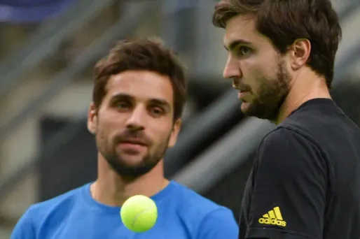Gilles Simon avec Arnaud Clément (1280x640) Arne DEDERT/AFP