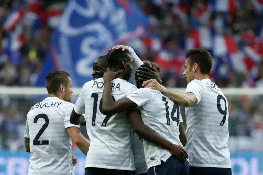 Paul Pogba (n°19) a inscrit le premier but de l'équipe de France, mardi soir, au Stade de France.