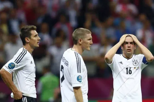 Klose, Schweinsteiger et Lahm, après la défaite face à l'Italie en demi-finale de l'Euro 2012.