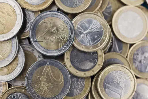 3.574 pièces de monnaie dans un sac à dos