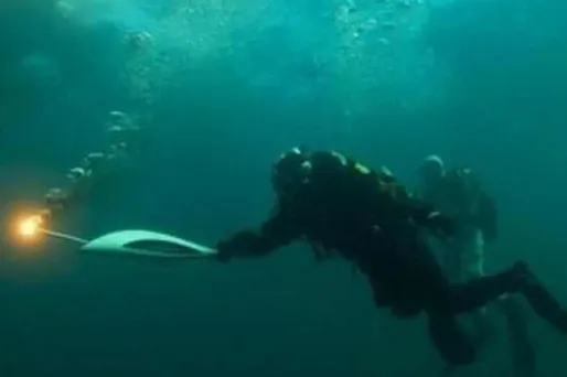 JO : la flamme olympique dans le lac Baïkal