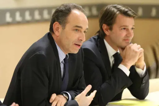 Jean-François Copé et François Baroin, lors d'un meeting pour les cantonales à Troyes. Ils ont défendu le débat sur la laïcité.