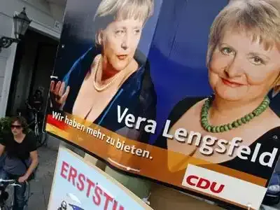Le décolleté de Merkel pour gagner des voix